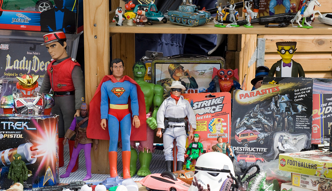 vintage collectible toys on shelves including action figures